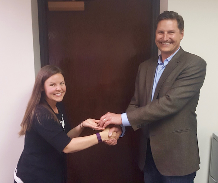 Hutch handing Jessica the keys to her and her family's first home!