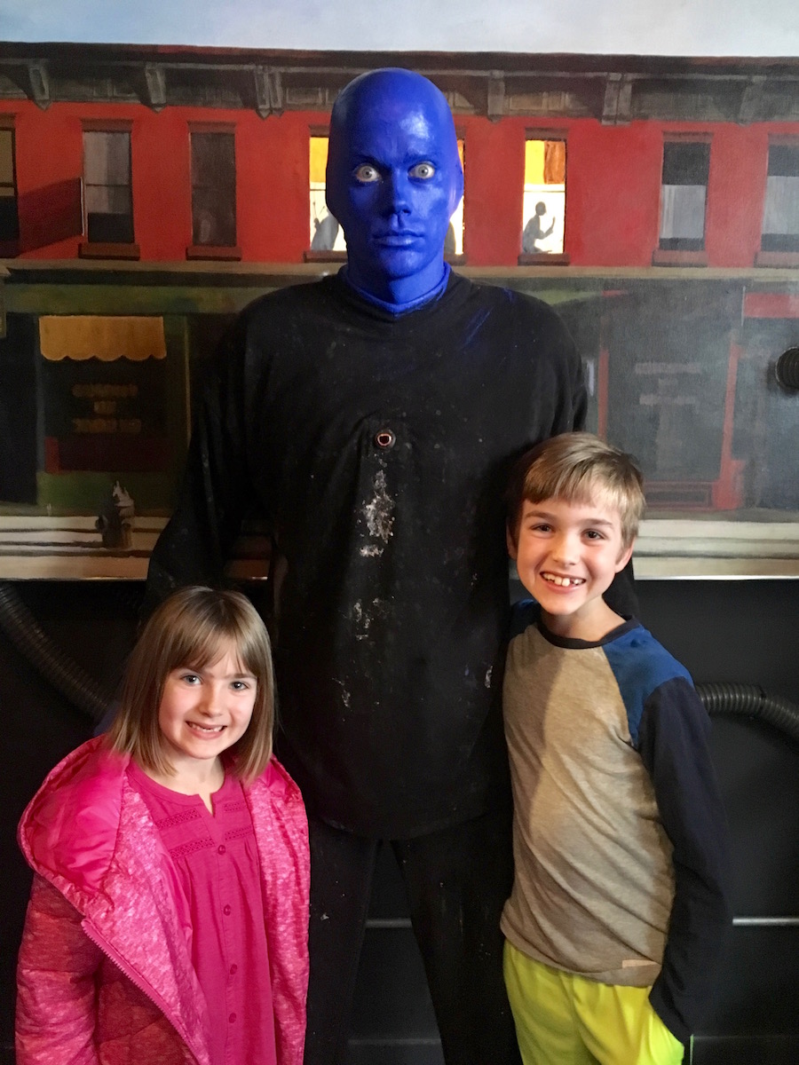 blue man group there are two main areas to wait in the room off to the side past the coat check and in the front vestibule
